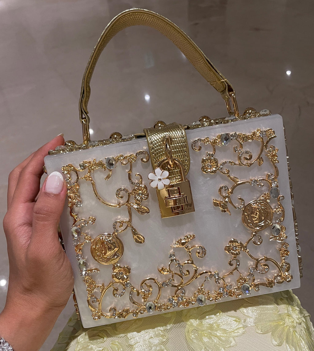 The Must Have Creamy White Masterpiece Clutch