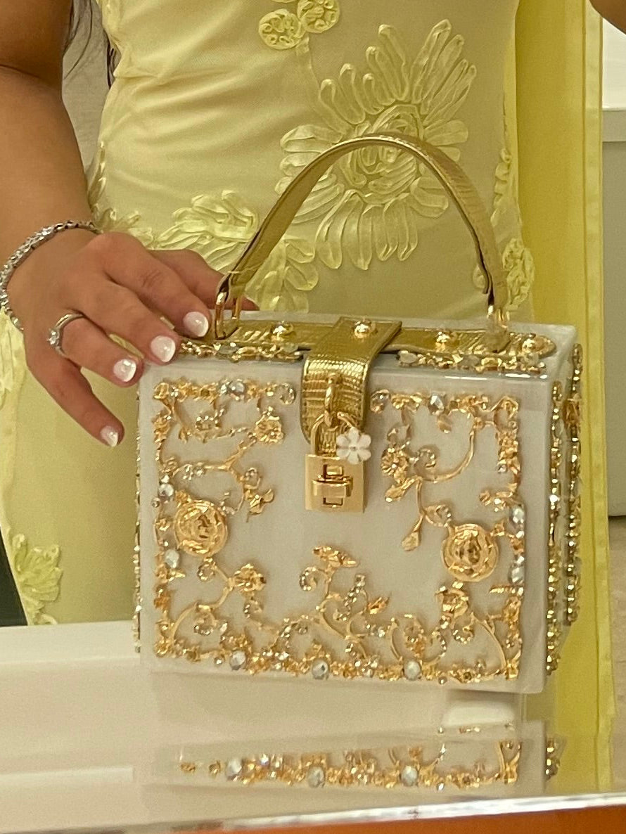 The Must Have Creamy White Masterpiece Clutch
