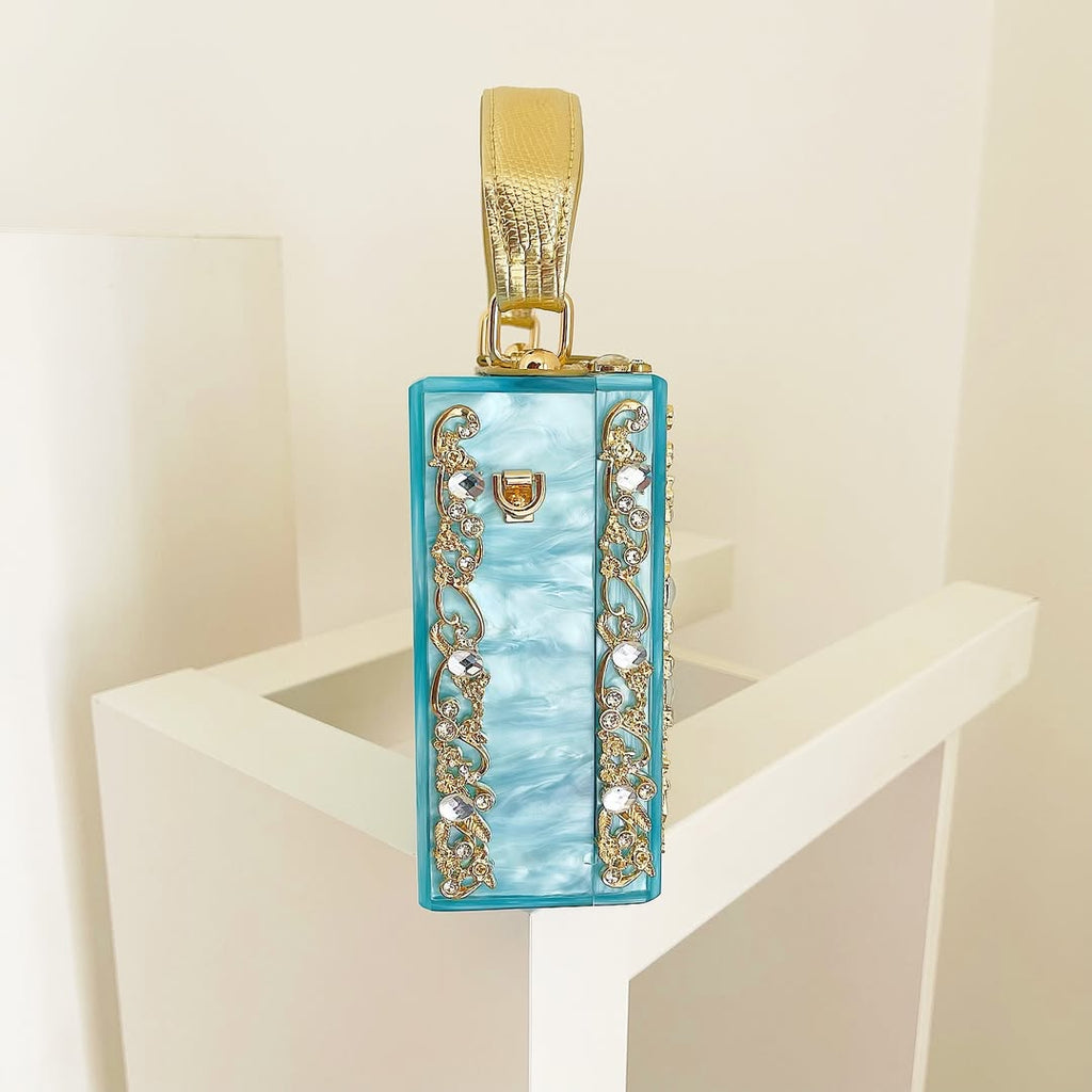The Must Have Turquoise Masterpiece Clutch