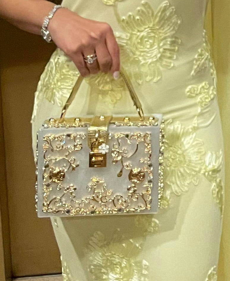 The Must Have Creamy White Masterpiece Clutch