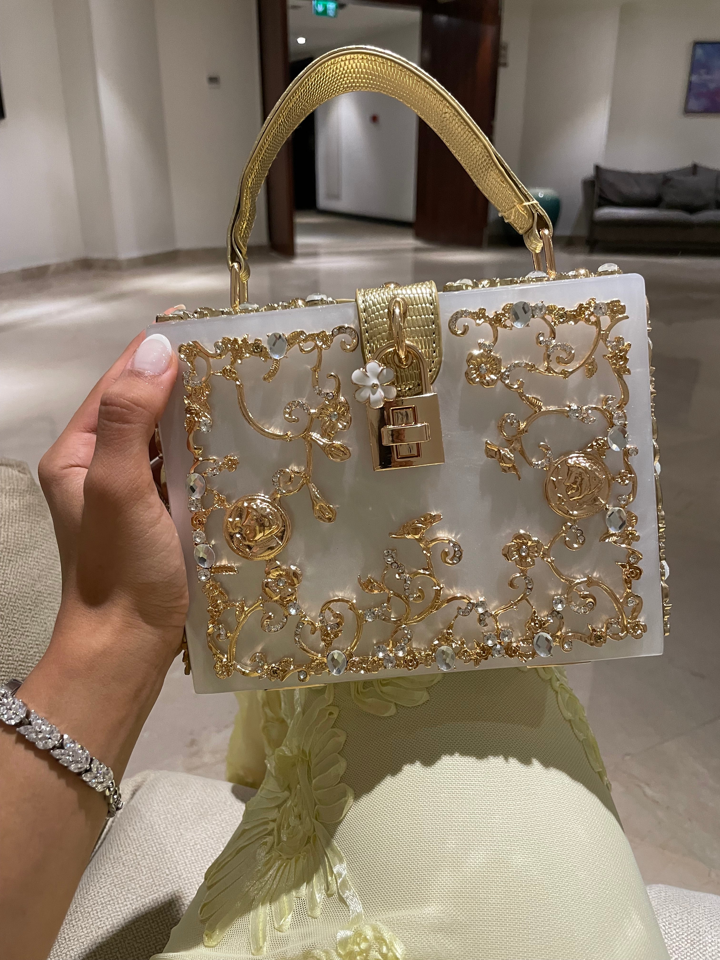 The Must Have Creamy White Masterpiece Clutch